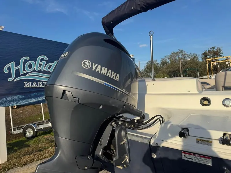 Slide: The Image of Yamaha outboard motor on 2018 Hurricane SS 232 boat at marina. - 10