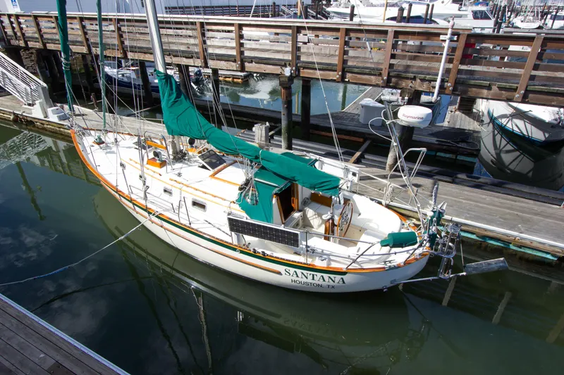 Slide: The Image of Sailboat docked at marina, Pacific Seacraft 34, 1992 model, named "Santana" from Houston, TX. - 6