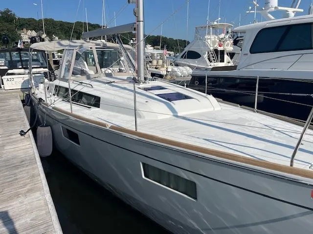 Slide: The Image of 2017 Beneteau Oceanis 38.1 sailboat docked in marina. - 0