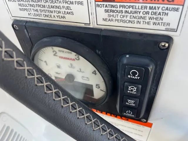 Slide: The Image of Control panel of a 2017 Beneteau Oceanis 38.1 sailboat with warning labels. - 24