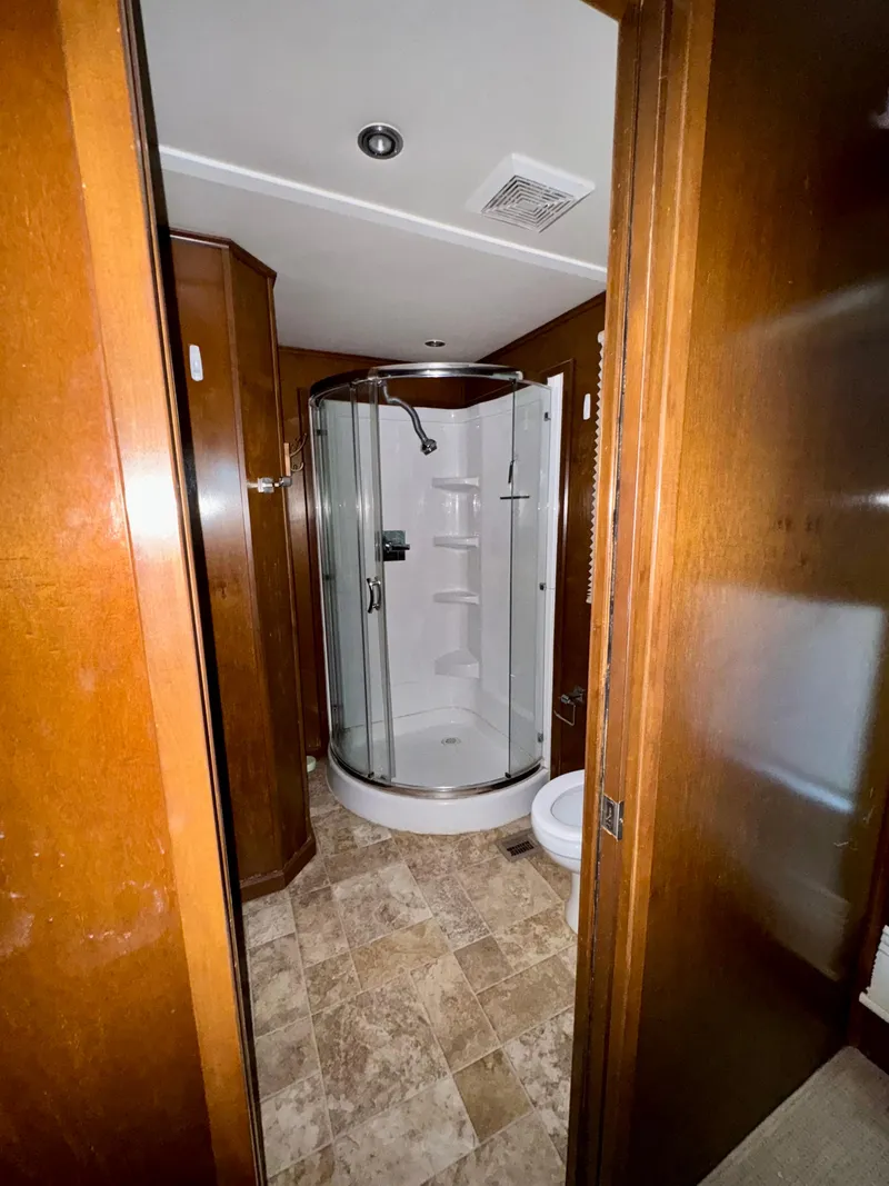 Slide: The Image of 2013 Bravada Bella Luna Trip #16 bathroom with modern shower and wood accents. - 20