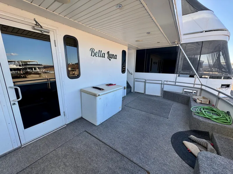 Slide: The Image of Bravada Bella Luna Trip #16 houseboat deck, 2013 model, with outdoor seating and storage. - 23
