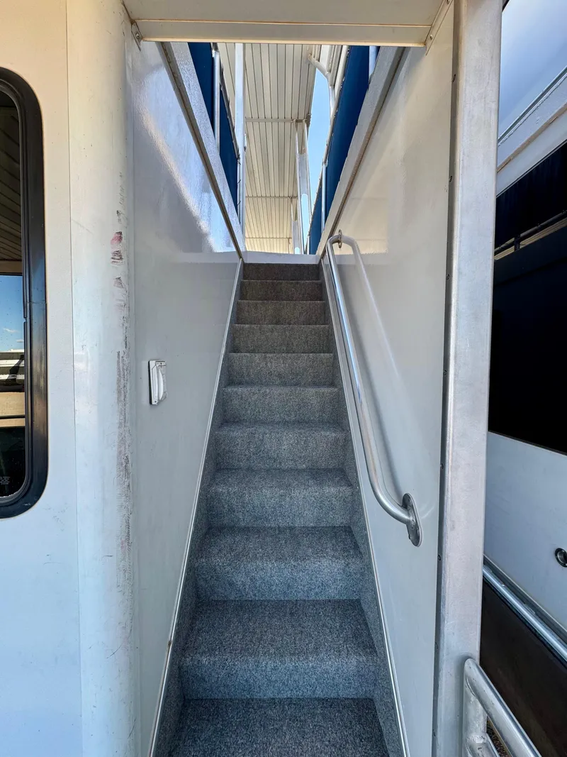 Slide: The Image of Staircase inside 2013 Bravada Bella Luna Trip #16 houseboat. - 24