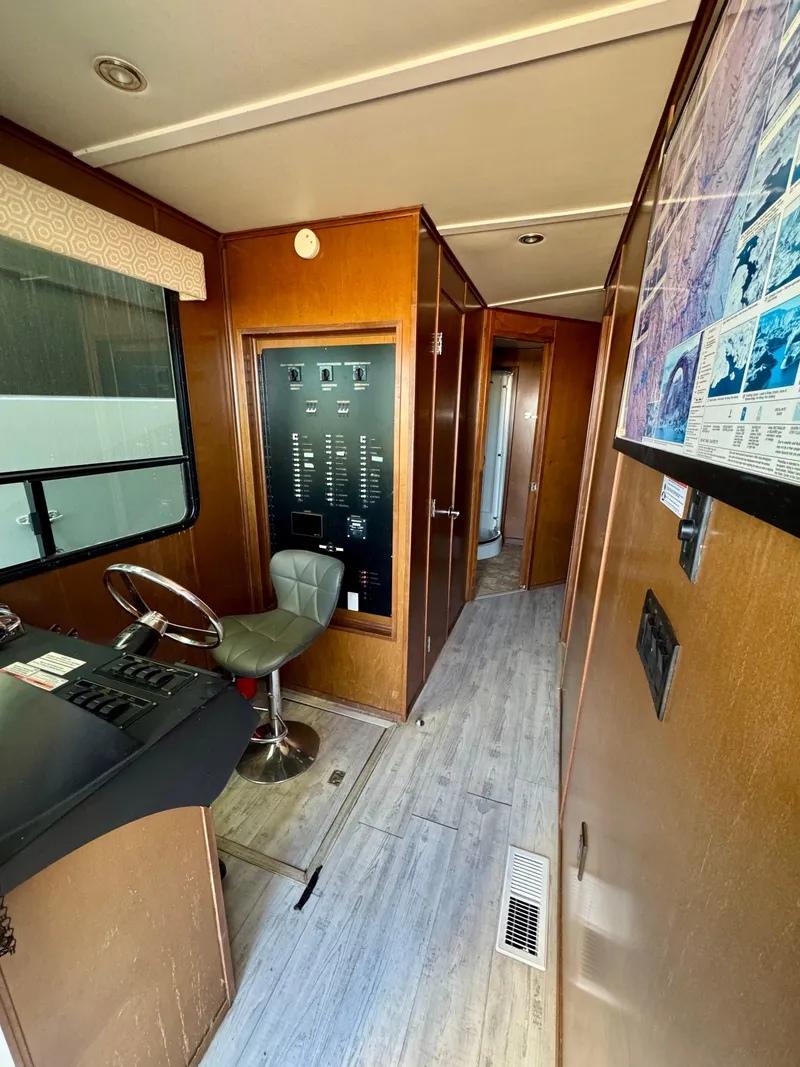 Slide: The Image of Interior of 2013 Bravada Bella Luna Trip #16, featuring control panel and seating. - 3