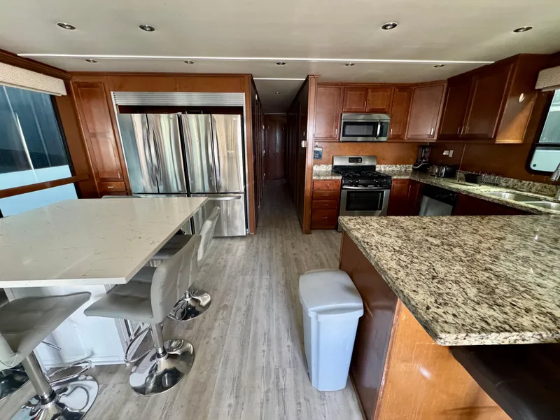 Slide: The Image of Modern kitchen in 2013 Bravada Bella Luna Trip #16 with granite countertops and stainless steel appliances. - 8