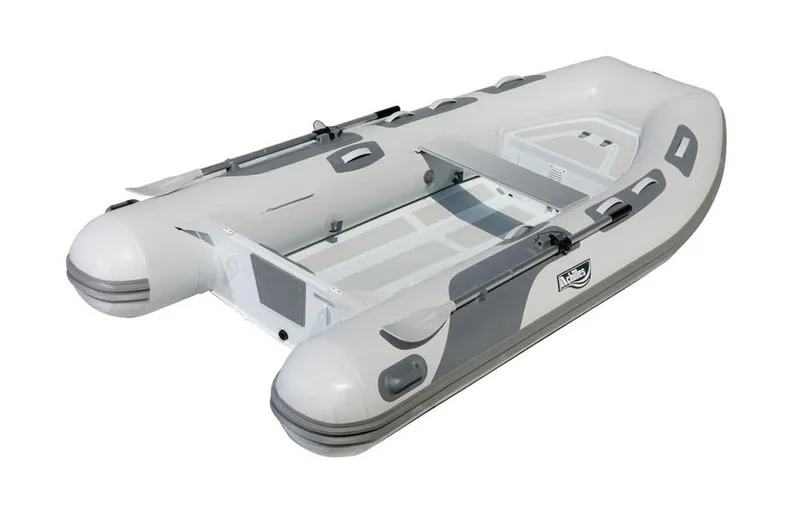 The Image of 2024 Achilles HB-310AX inflatable boat, white and gray, side view. - 1