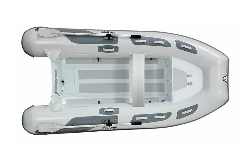 Slide: The Image of 2024 Achilles HB-310AX inflatable boat, top view, white and grey design. - 2
