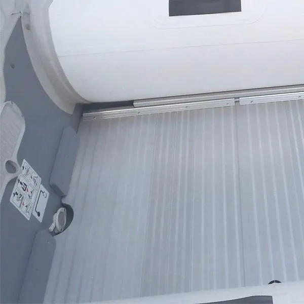 Slide: The Image of 2023 Zodiac Cadet 310 Aluminum boat interior with ribbed flooring. - 4