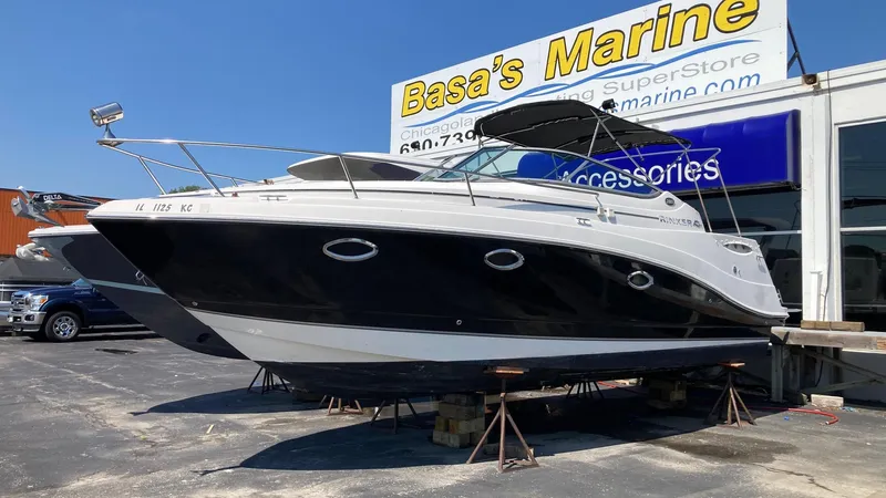 Slide: The Image of 2007 Rinker 280 Express Cruiser at Basa's Marine dealership. - 0