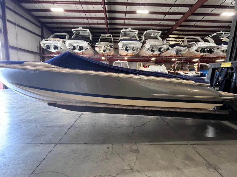 Slide: The Image of 2018 Chris-Craft 27 Launch boat in indoor storage facility. - 1