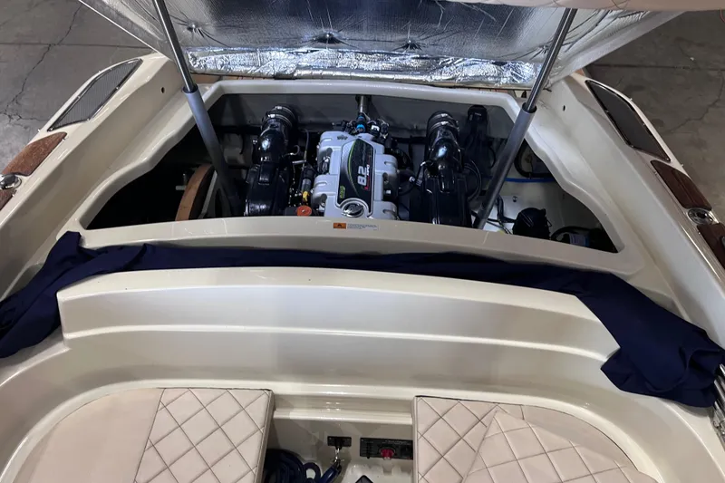 Slide: The Image of 2018 Chris-Craft 27 Launch boat engine compartment with open hatch. - 10