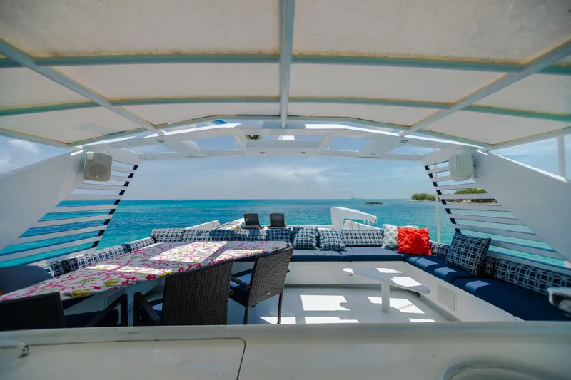 Slide: The Image of Luxurious 1991 Broward Motor Yacht with spacious deck and ocean view. - 20