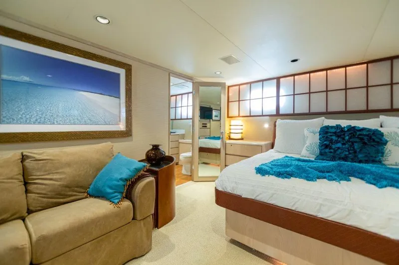 Slide: The Image of Luxurious bedroom interior of a 1991 Broward Motor Yacht with modern decor. - 45