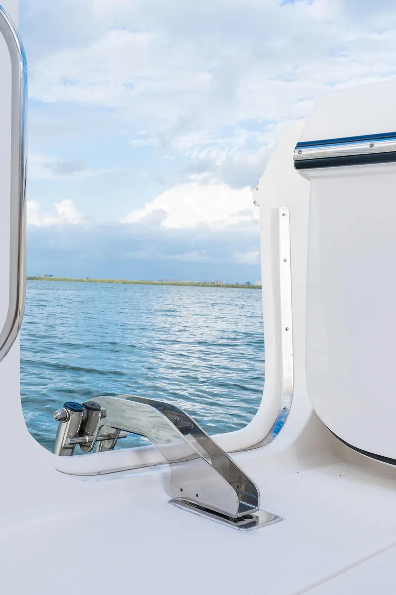 Slide: The Image of 2025 Pursuit DC 365 Dual Console boat with ocean view. - 18