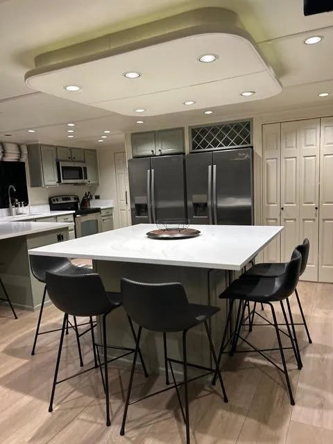 Slide: The Image of Modern kitchen in 2008 Sumerset Red Rocks Trip 5 houseboat with island and stainless steel appliances. - 30