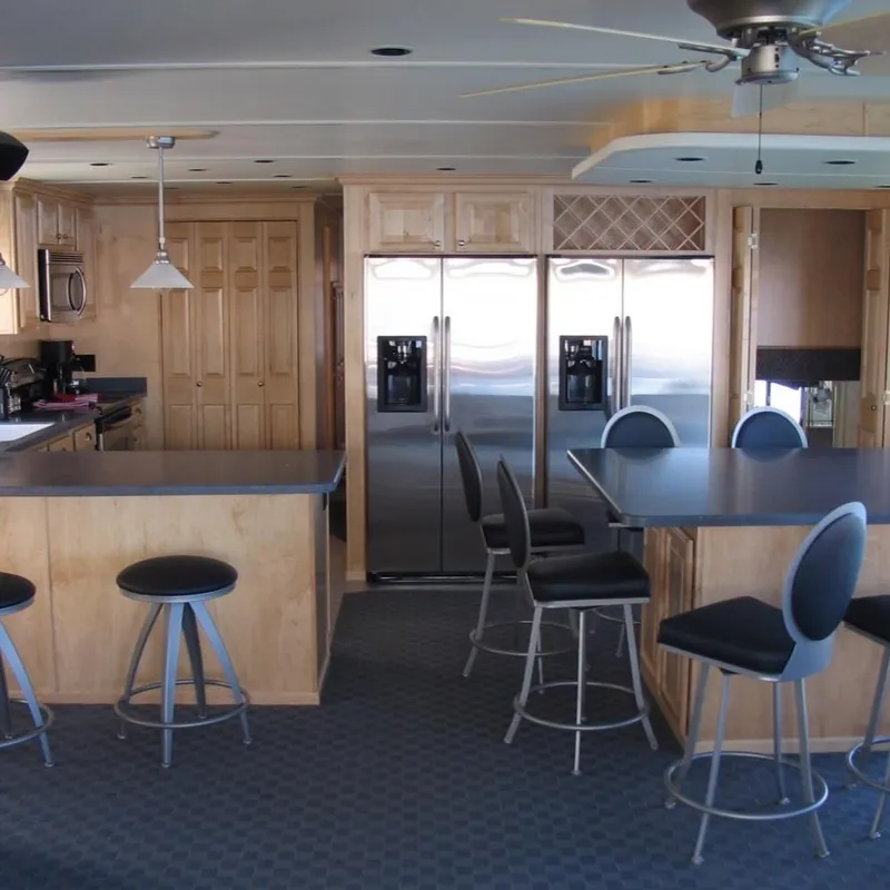 Slide: The Image of Modern kitchen interior of 2008 Sumerset Red Rocks Trip 5 houseboat with stainless steel appliances. - 9