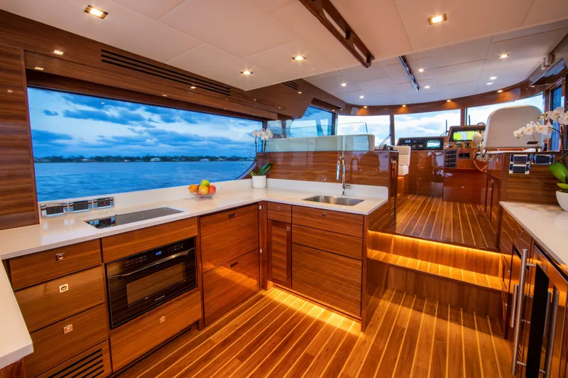Slide: The Image of Luxurious kitchen interior of 2025 Summit 54 yacht with modern appliances and ocean view. - 1