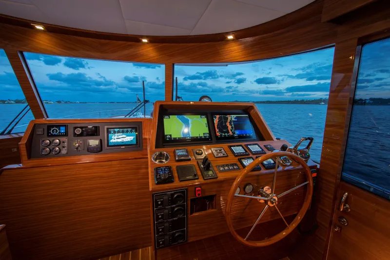 Slide: The Image of Modern helm of the 2025 Summit 54 yacht with advanced navigation systems. - 5