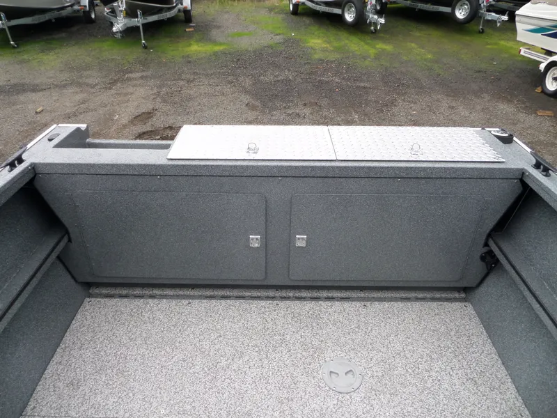 Slide: The Image of 2018 Alumaweld Blackhawk boat interior with storage compartments. - 10