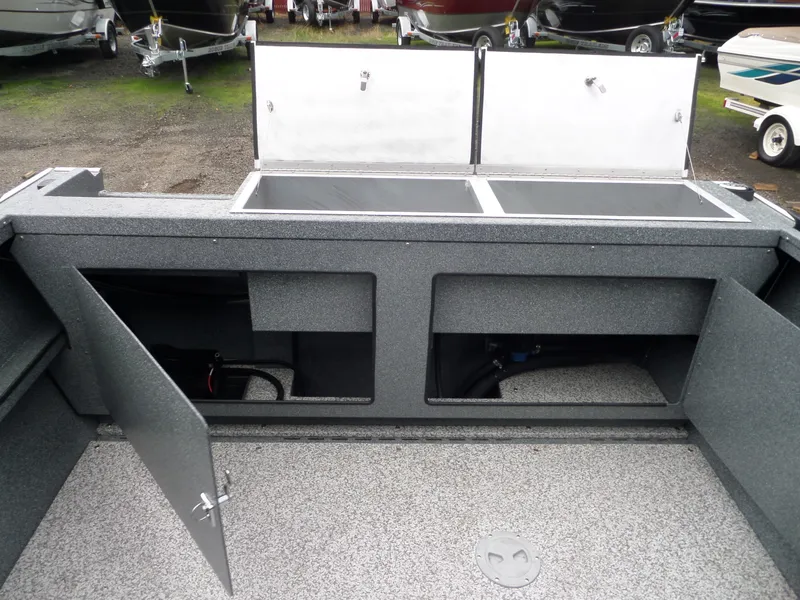 Slide: The Image of 2018 Alumaweld Blackhawk boat storage compartments and open hatches. - 11