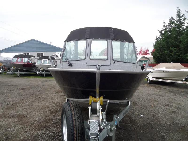 Slide: The Image of 2018 Alumaweld Blackhawk boat on trailer in a boatyard. - 7