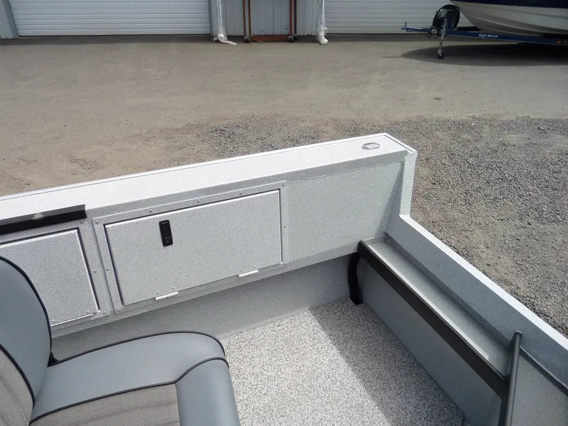 Slide: The Image of Interior of a 2018 Alumaweld Columbia boat showing seating and storage compartments. - 10