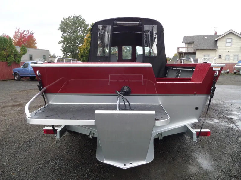 Slide: The Image of 2018 Alumaweld Intruder boat rear view with red and silver finish. - 3