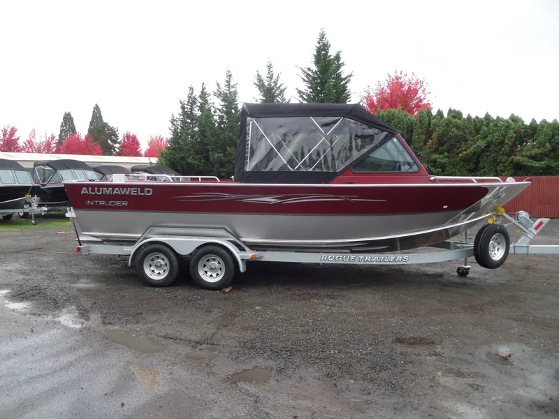 Slide: The Image of 2018 Alumaweld Intruder boat on Rogue Trailers, side view. - 9