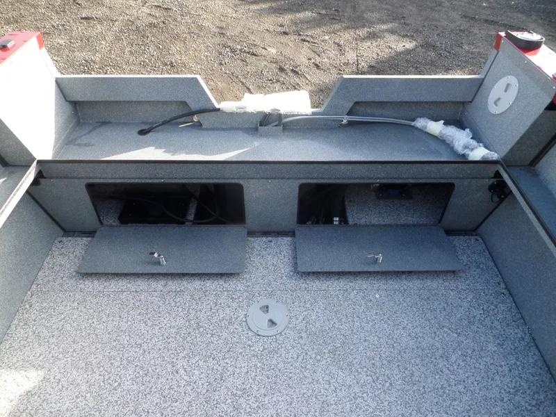 Slide: The Image of 2018 Alumaweld Stryker boat interior storage compartments and deck. - 11