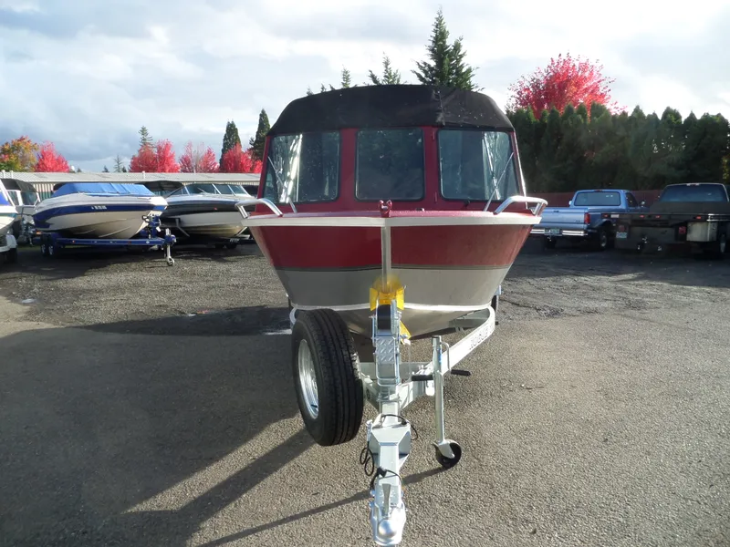 Slide: The Image of 2018 Alumaweld Stryker boat on trailer in a parking lot. - 3