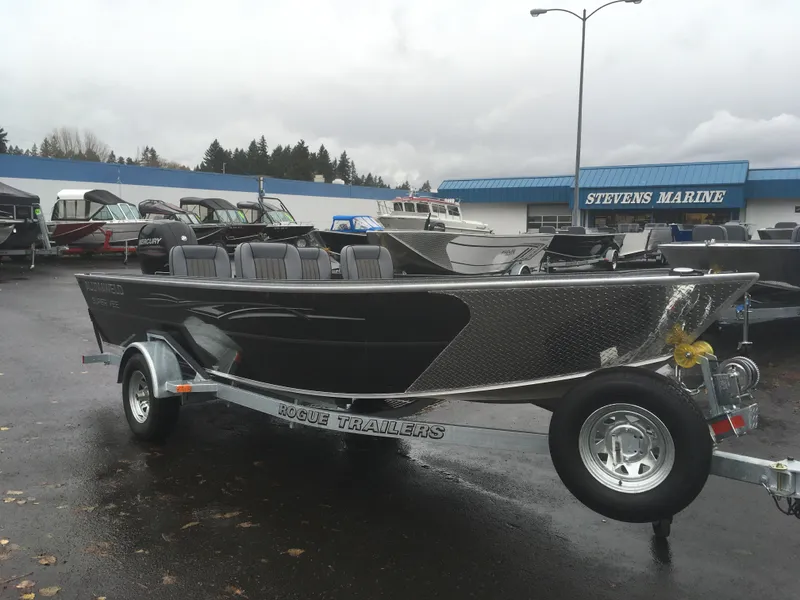 Slide: The Image of 2018 Alumaweld Super Vee boat on Rogue Trailers at Stevens Marine dealership. - 4