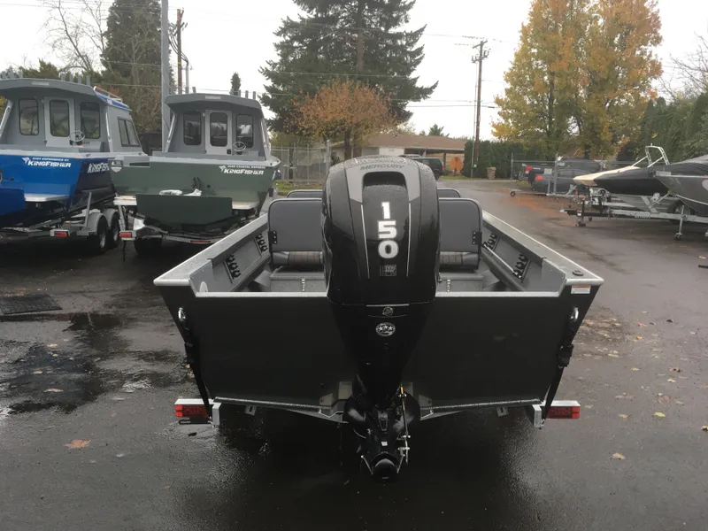 Slide: The Image of 2018 Alumaweld Super Vee boat with Mercury 150 outboard motor in a parking lot. - 7