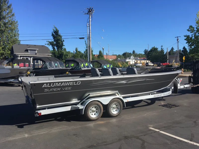 Slide: The Image of 2018 Alumaweld Super Vee Pro boat on a trailer in a parking lot. - 4