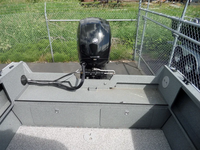 Slide: The Image of 2017 Alumaweld BLACKHAWK JET boat with outboard motor, rear view. - 11