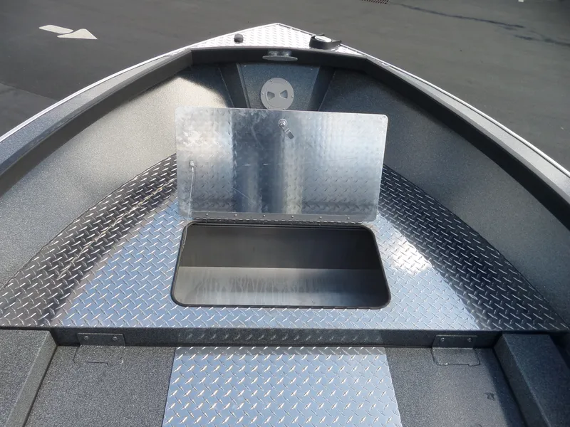 Slide: The Image of 2017 Alumaweld Free Drifter boat interior with diamond plate flooring. - 7