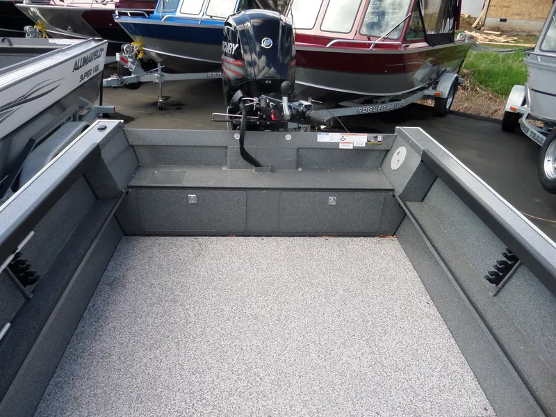 Slide: The Image of 2017 Alumaweld Free Drifter boat interior with Mercury outboard motor. - 9