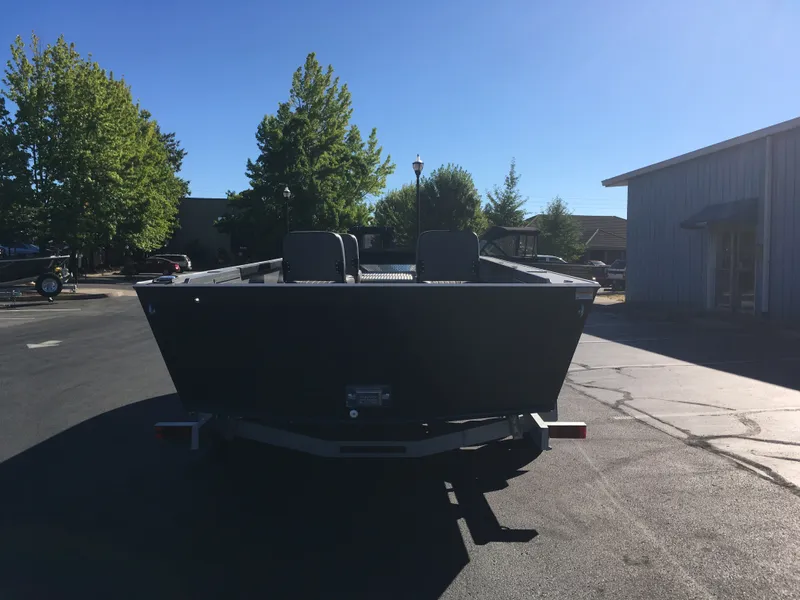 Slide: The Image of 2017 Alumaweld Super Vee Pro boat on trailer in parking lot. - 3