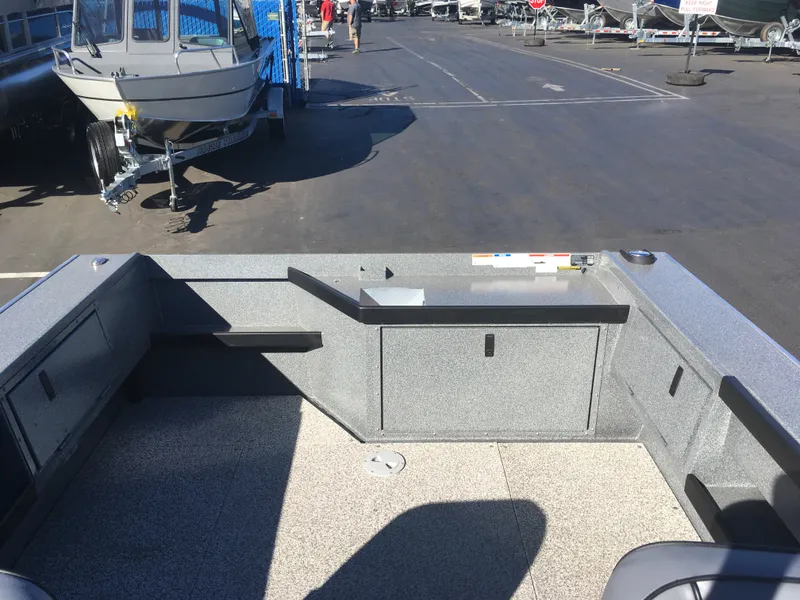 Slide: The Image of 2017 Alumaweld Super Vee Pro boat interior at a dealership. - 8