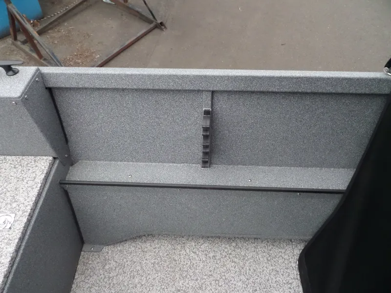 Slide: The Image of Interior view of 2017 Alumaweld TALON boat, showing storage compartment. - 12