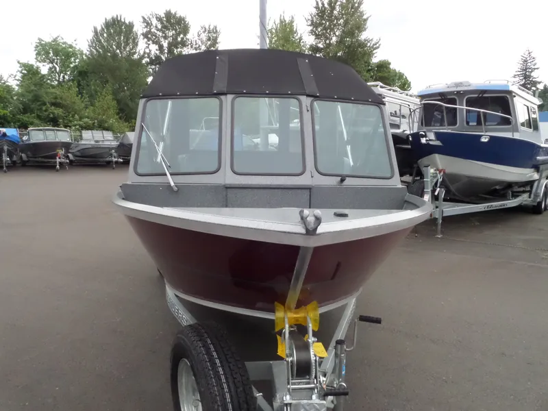 Slide: The Image of 2017 Alumaweld TALON boat on trailer, front view, in a boatyard. - 3