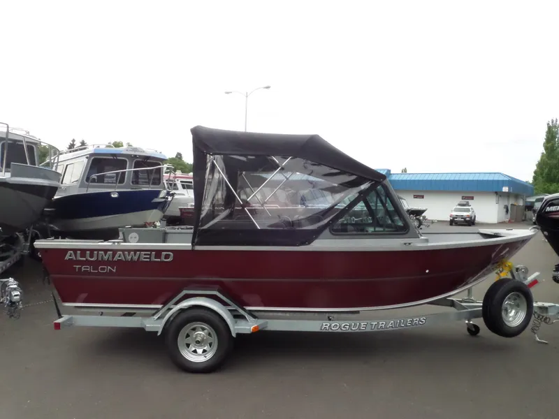 Slide: The Image of 2017 Alumaweld Talon boat on Rogue Trailer, maroon color, side view. Save $3000. - 6