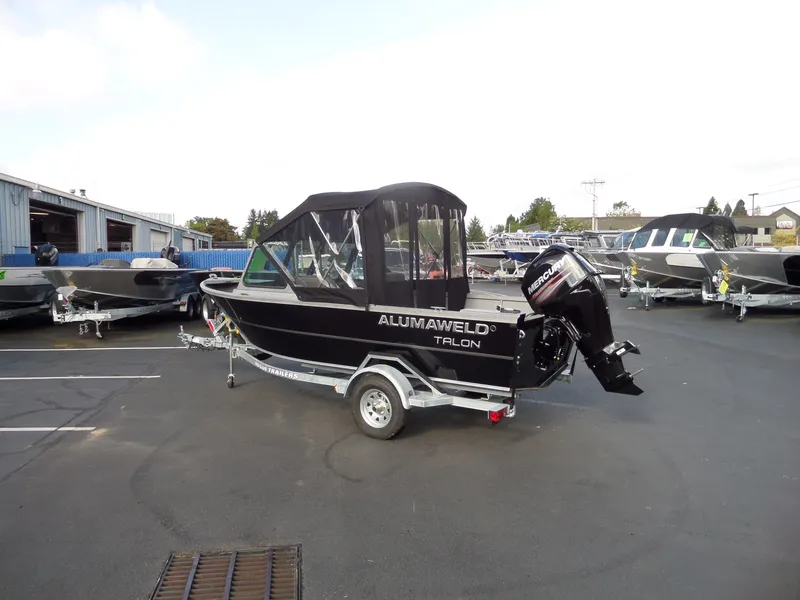 Slide: The Image of 2017 Alumaweld Talon boat on trailer in dealership lot. - 10