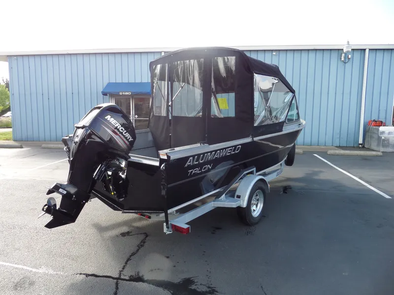 Slide: The Image of 2017 Alumaweld Talon boat with Mercury outboard motor on trailer. - 4