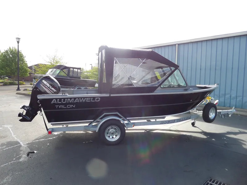 Slide: The Image of 2017 Alumaweld Talon boat on trailer with Mercury outboard motor. - 5