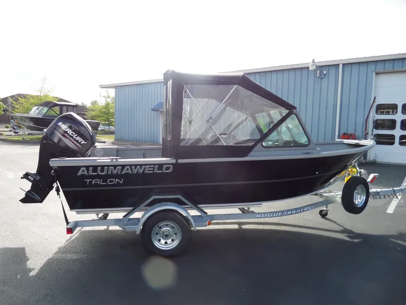Slide: The Image of 2017 Alumaweld Talon boat on trailer with Mercury outboard motor. - 6