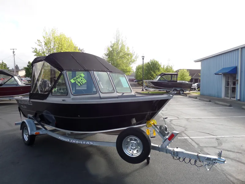Slide: The Image of 2017 Alumaweld TALON boat on Rogue Trailer, Save $3500 sign. - 7