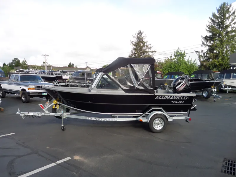 Slide: The Image of 2017 Alumaweld Talon boat on trailer in dealership lot. - 9