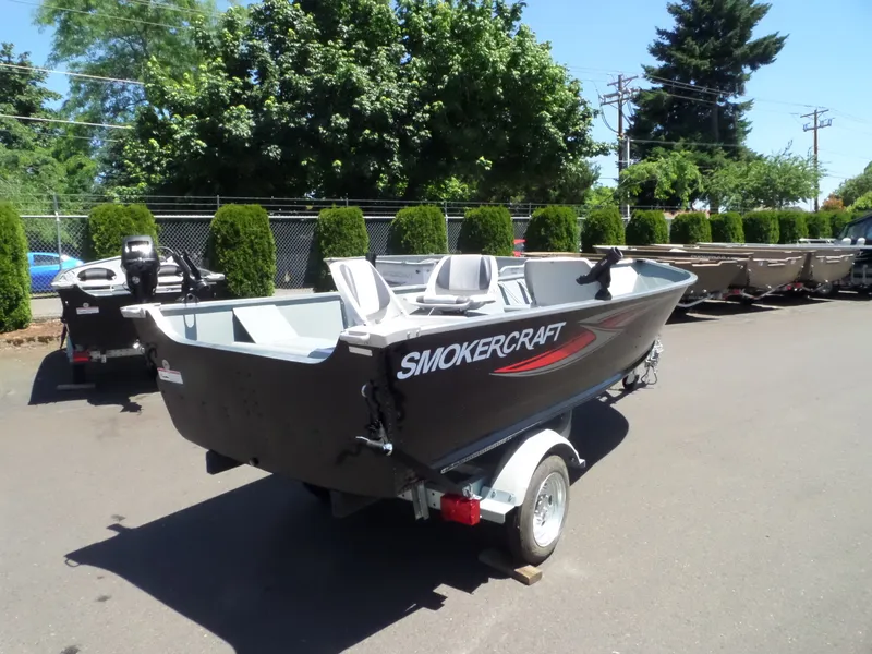Slide: The Image of 2017 Smoker Craft Alaskan boat on trailer in outdoor lot. - 9