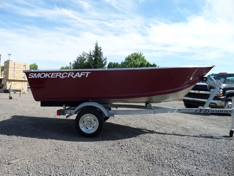 Slide: The Image of 2017 Smoker Craft Alaskan boat on trailer in outdoor setting. - 4