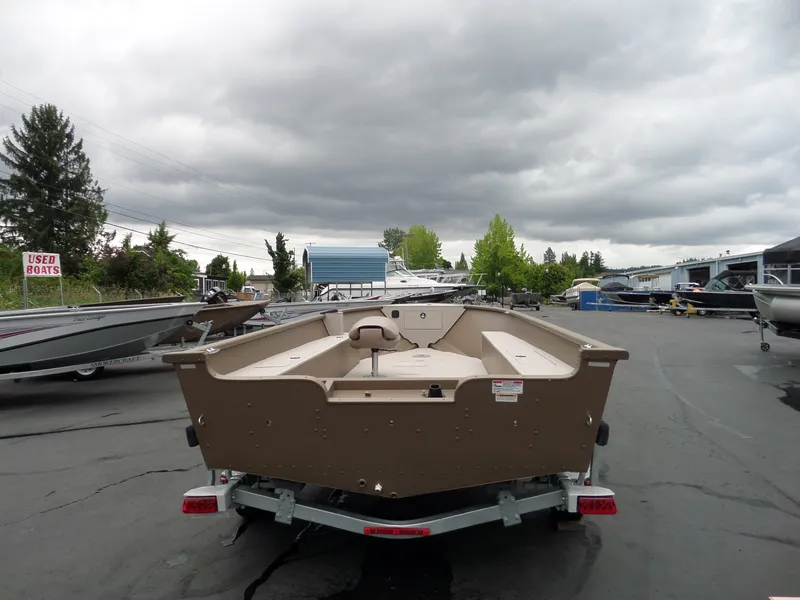 Slide: The Image of 2017 Smoker Craft Freedom boat on trailer at used boat dealership. - 6